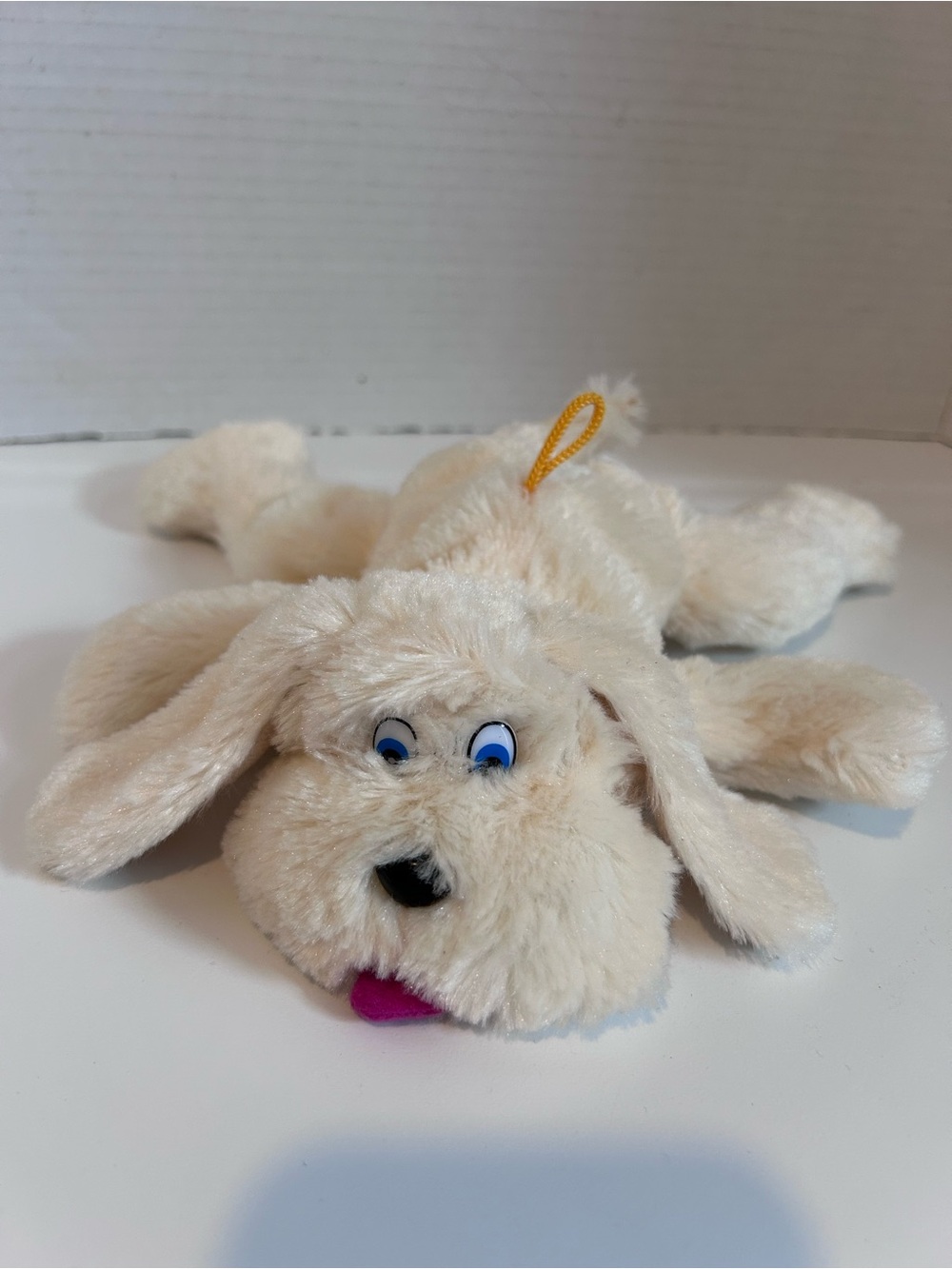 Cream Plush Dog Toy with Blue Eyes